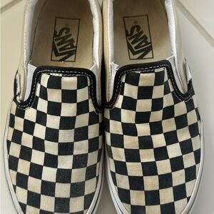Vans Black and Cream Checkerboard Slip-On Sneakers